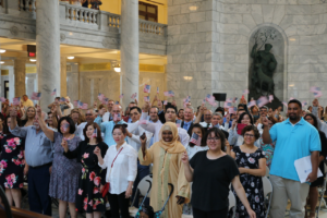 New citizens waving flags